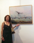 Artista con su obra